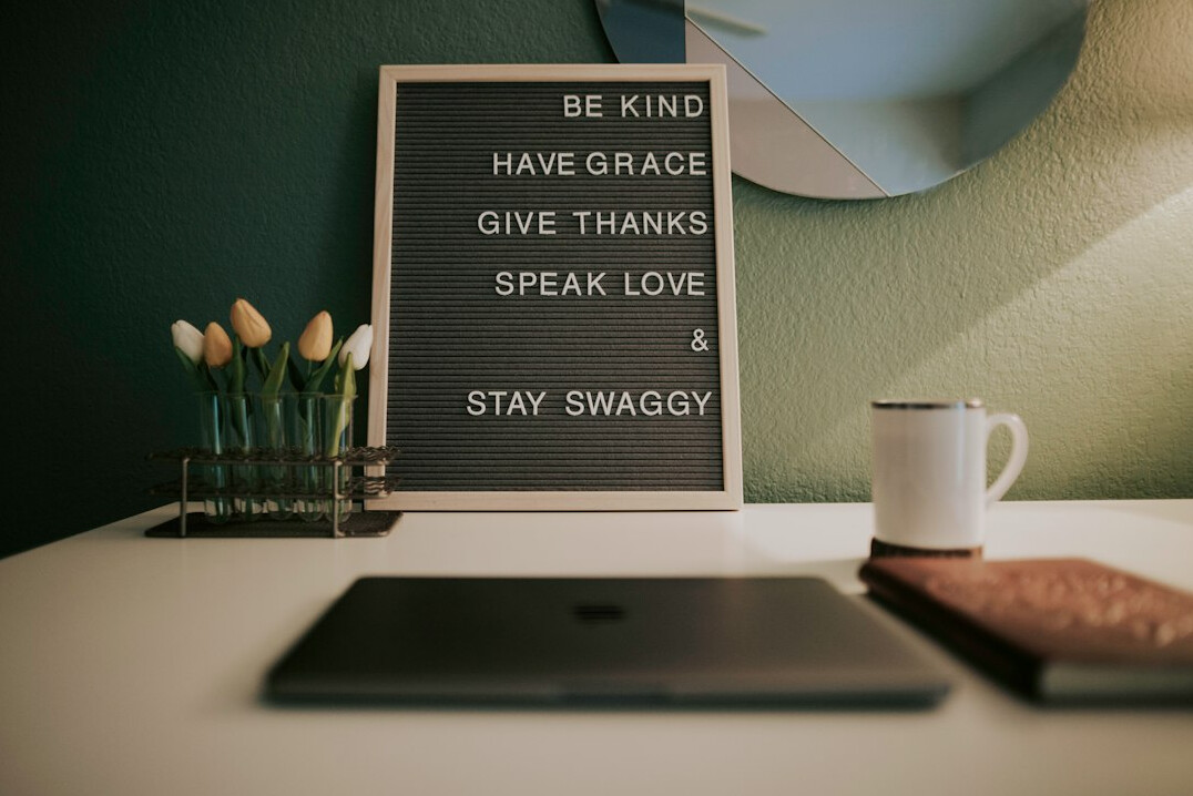 Clean workspace with laptop and coffee